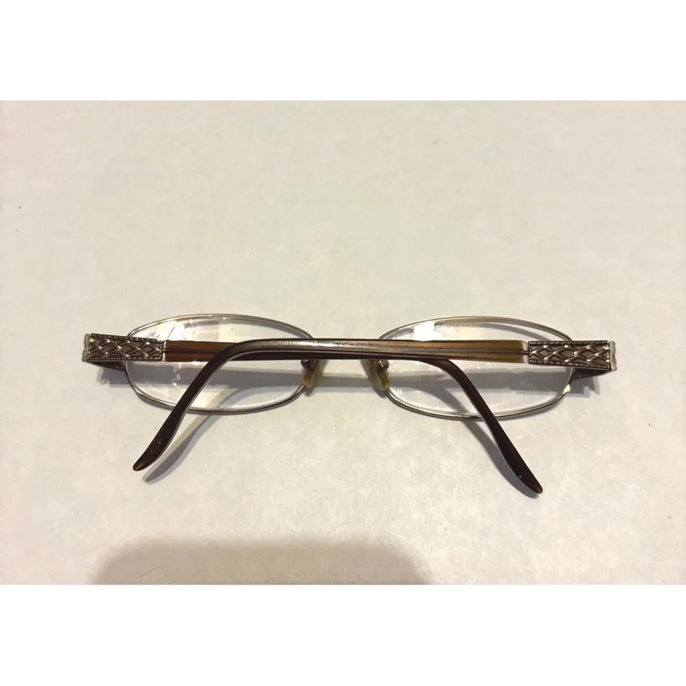 Vtg Marchon Oval Gold-Tone Eyeglasses With Intricate Side Details Frames only